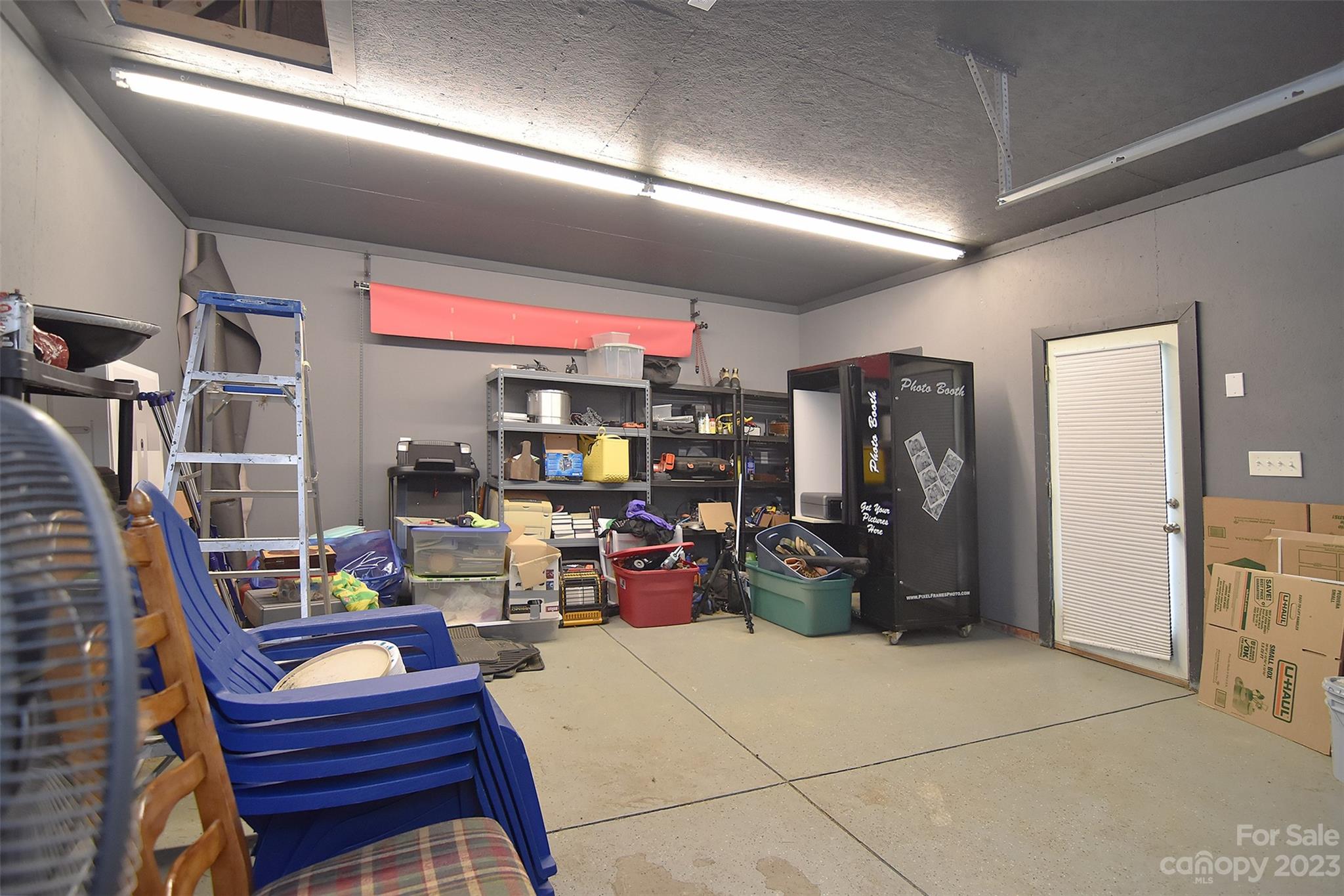 4913 Campobello Drive Monroe, NC 28110 - Photo 41 of 46 a living room with lots of furniture and clutter