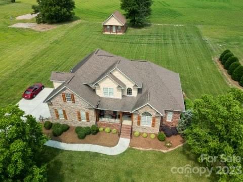 4913 Campobello Drive Monroe, NC 28110 - Photo 42 of 46 a aerial view of a house with swimming pool having outdoor seating