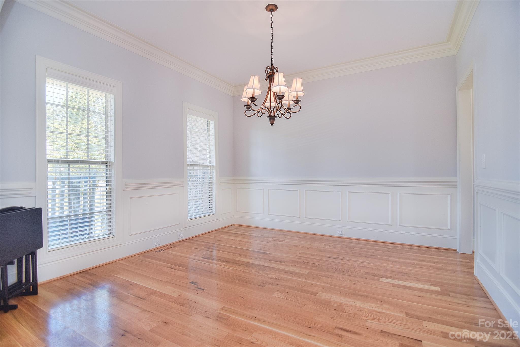 4913 Campobello Drive Monroe, NC 28110 - Photo 6 of 46 a view of empty room with wooden floor and fan