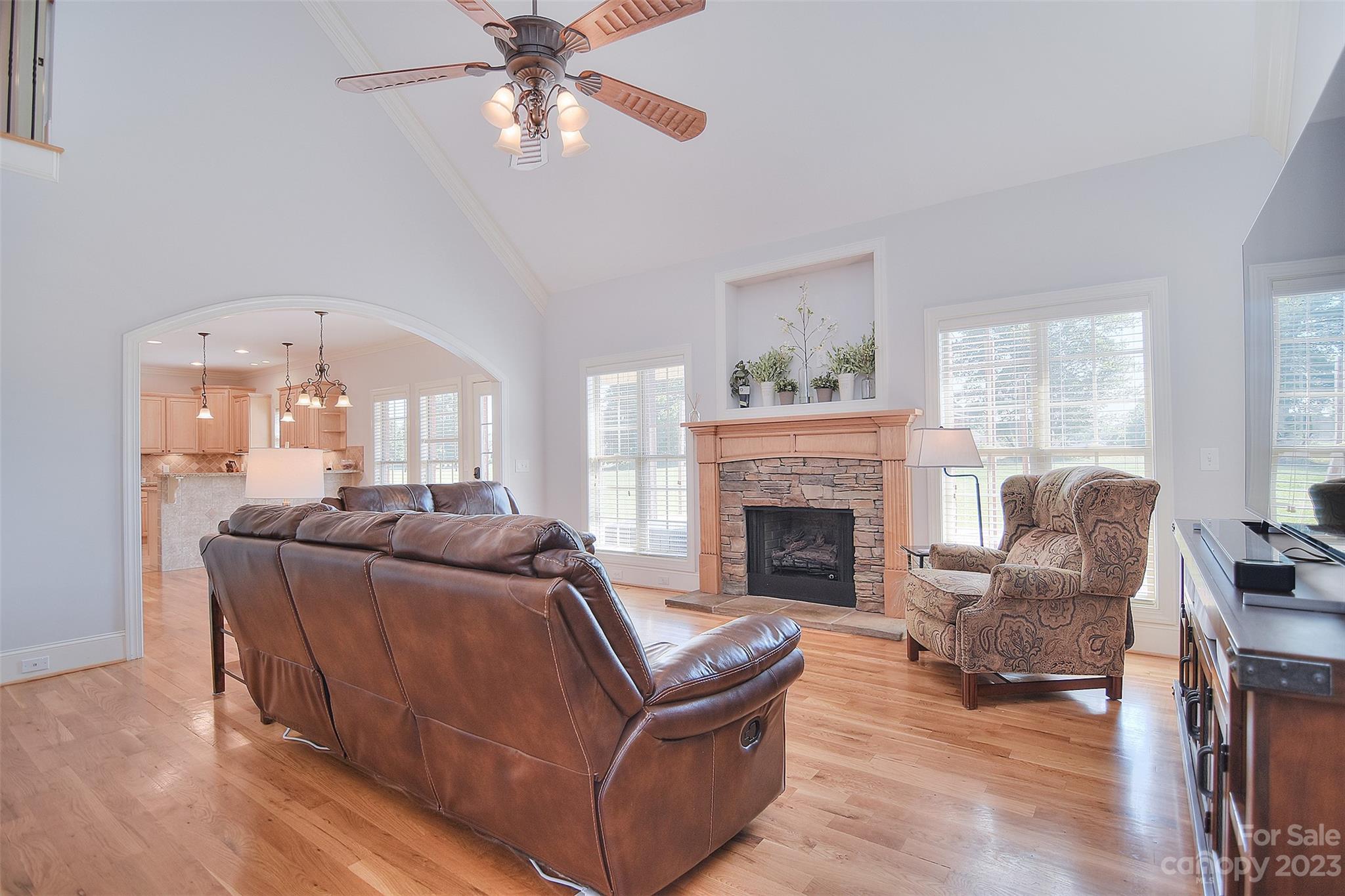 4913 Campobello Drive Monroe, NC 28110 - Photo 8 of 46 a living room with furniture and a fireplace