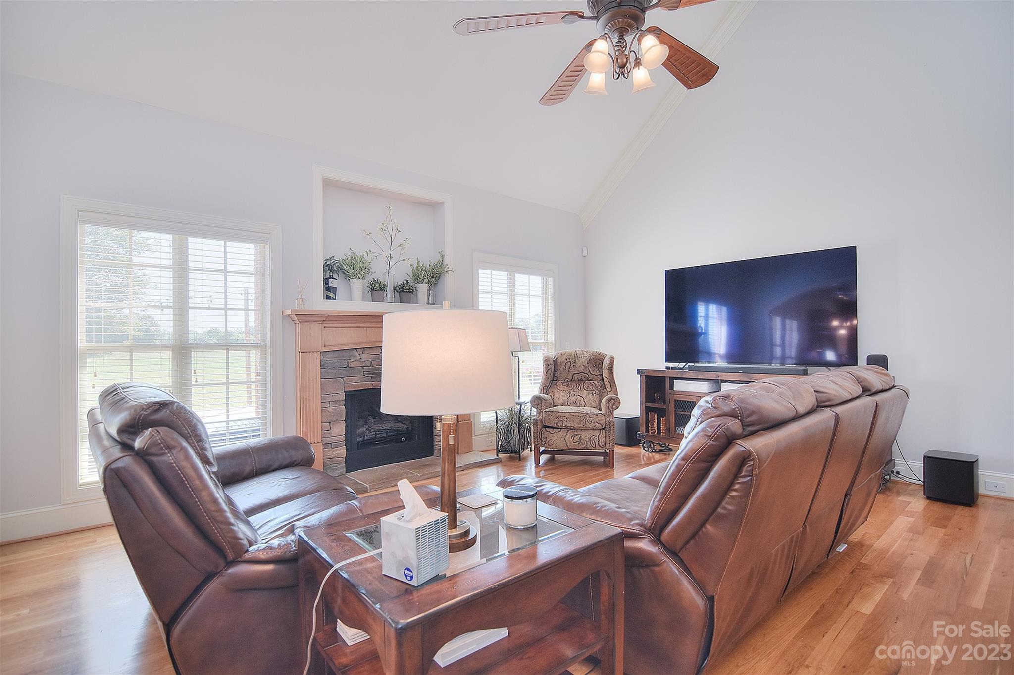 4913 Campobello Drive Monroe, NC 28110 - Photo 9 of 46 a living room with furniture fireplace and a large window