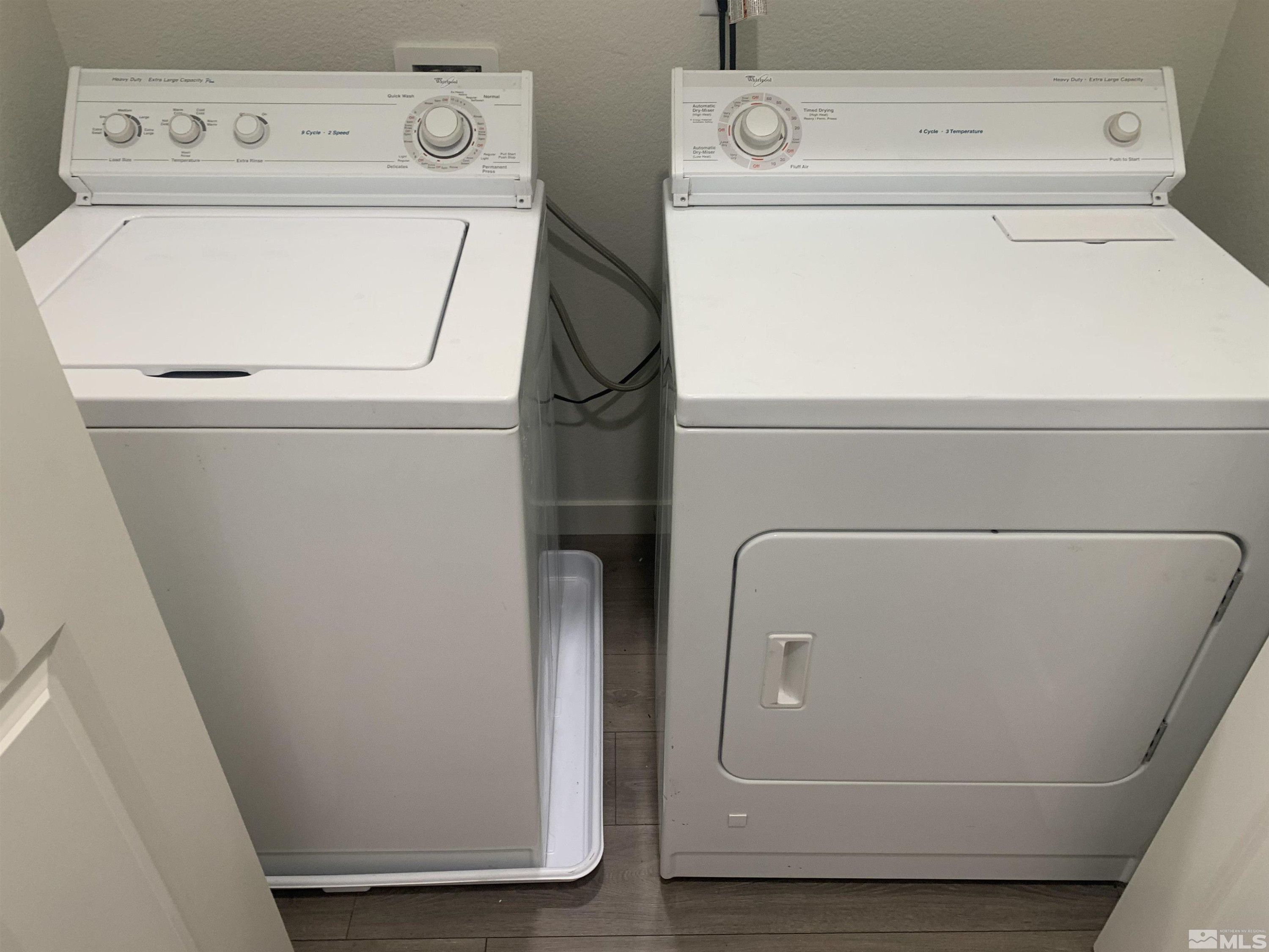 8839 Wolf Moon Drive Reno, NV 89506 - Photo 15 of 15 a utility room with dryer and washer