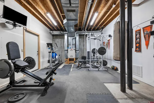 a view of a room with gym equipment