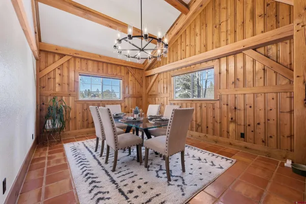 a bathroom with a granite countertop sink mirror and