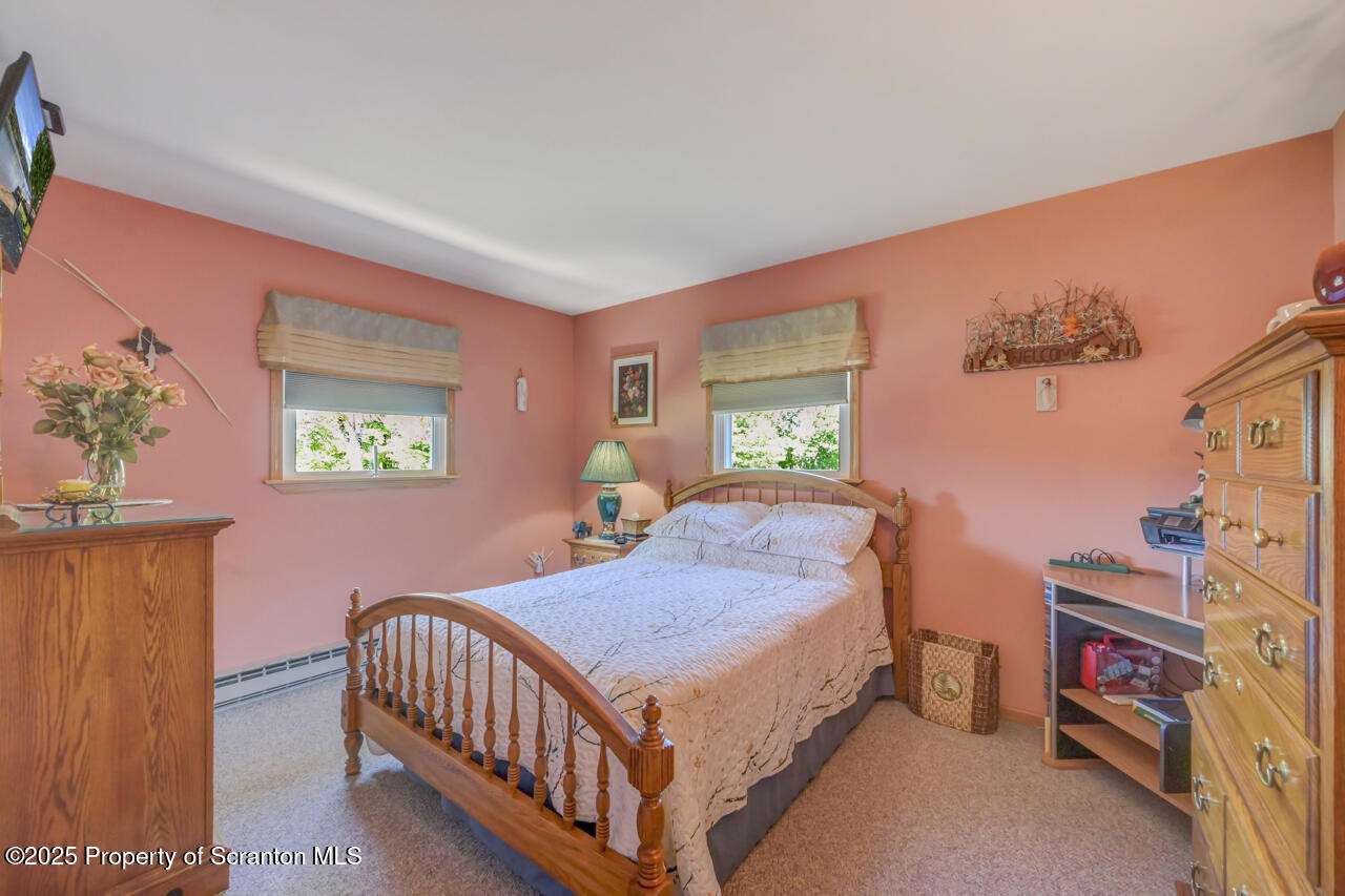 143 Beech Road Moscow, PA 18444 - Photo 44 of 89 a bedroom with a bed and a window