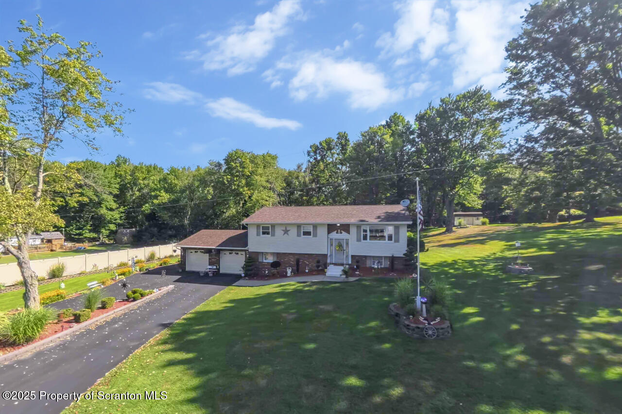 143 Beech Road Moscow, PA 18444 - Photo 69 of 89 a view of a house with a big yard