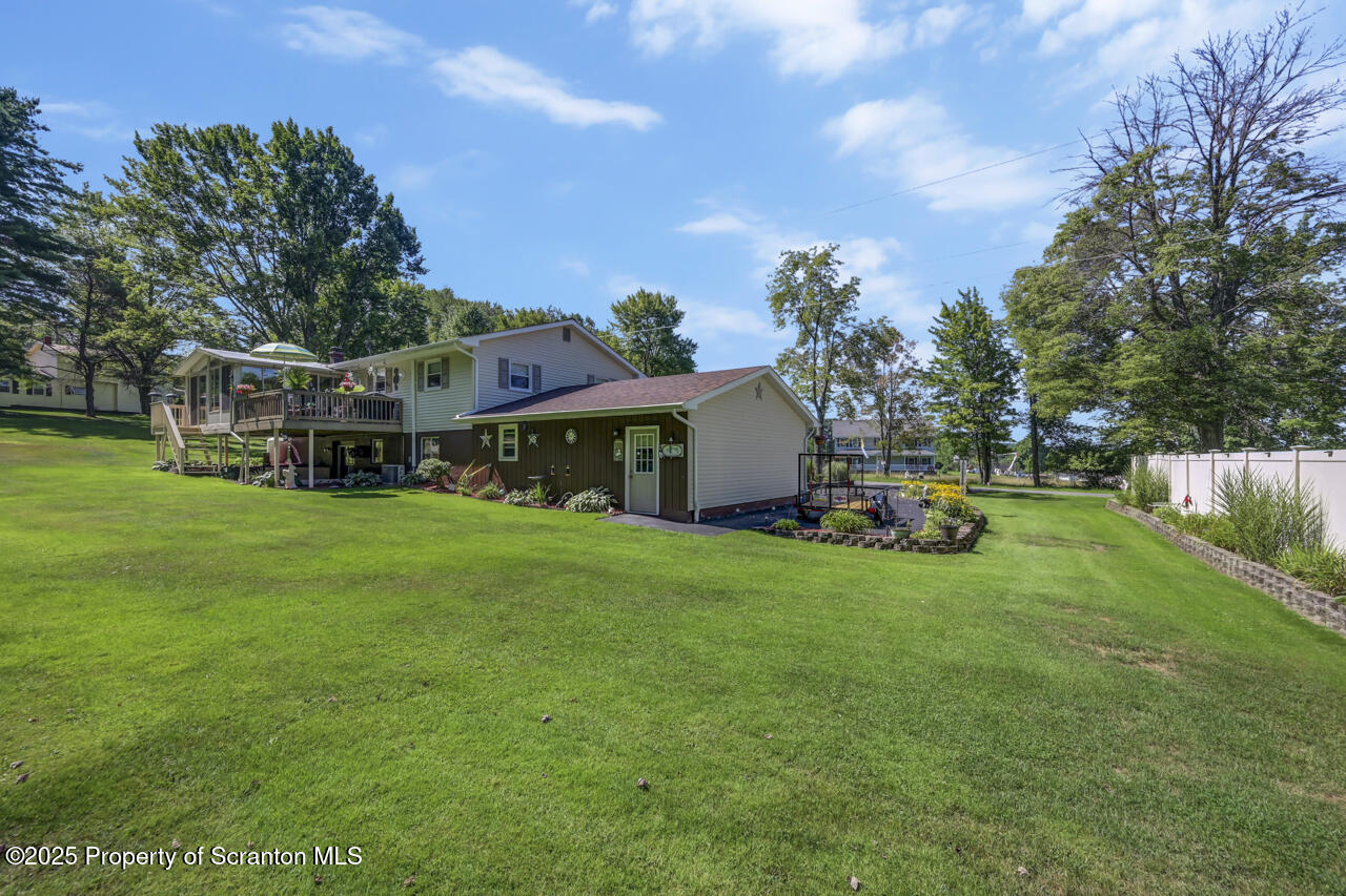 143 Beech Road Moscow, PA 18444 - Photo 75 of 89 a view of a house with a big yard and large trees