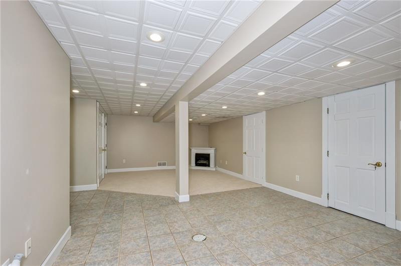 102 Franklin Road South Mars, PA 16046 - Photo 25 of 25 Game room with new fireplace and carpet