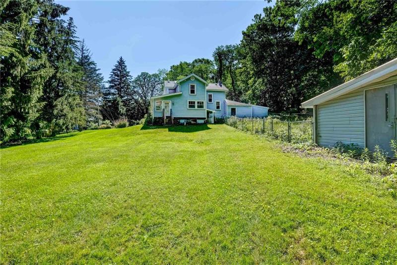 102 Franklin Road South Mars, PA 16046 - Photo 5 of 25 Rear of the home with shed at the side fence has been removed