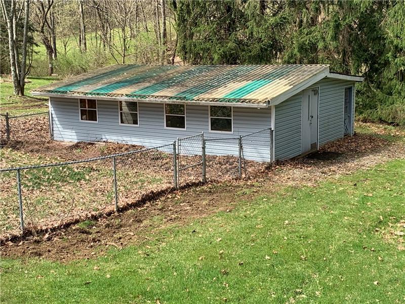 102 Franklin Road South Mars, PA 16046 - Photo 6 of 25 Fence has been removed Shed on the back portion of the property USES_"she shed" or "Man's cave" or maybe just a shed