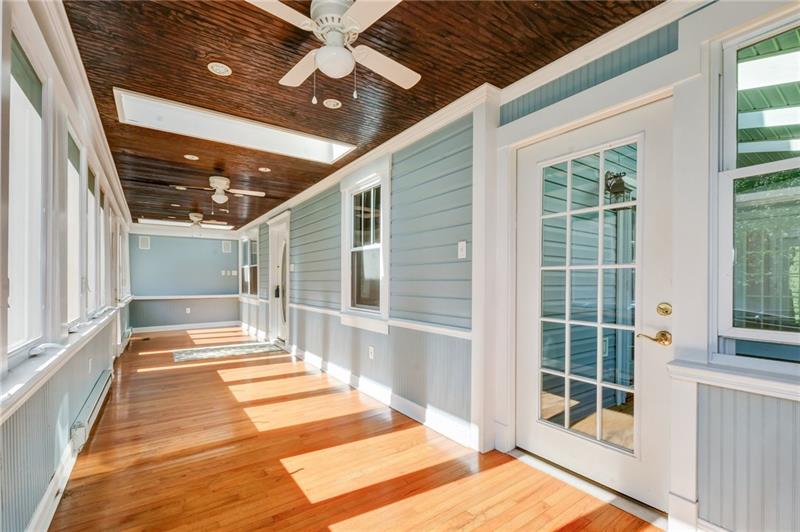 102 Franklin Road South Mars, PA 16046 - Photo 9 of 25 View of the 33 foot all weather sun room. Enjoy coffee on the sun porch in the winter! built in sound system in this room also