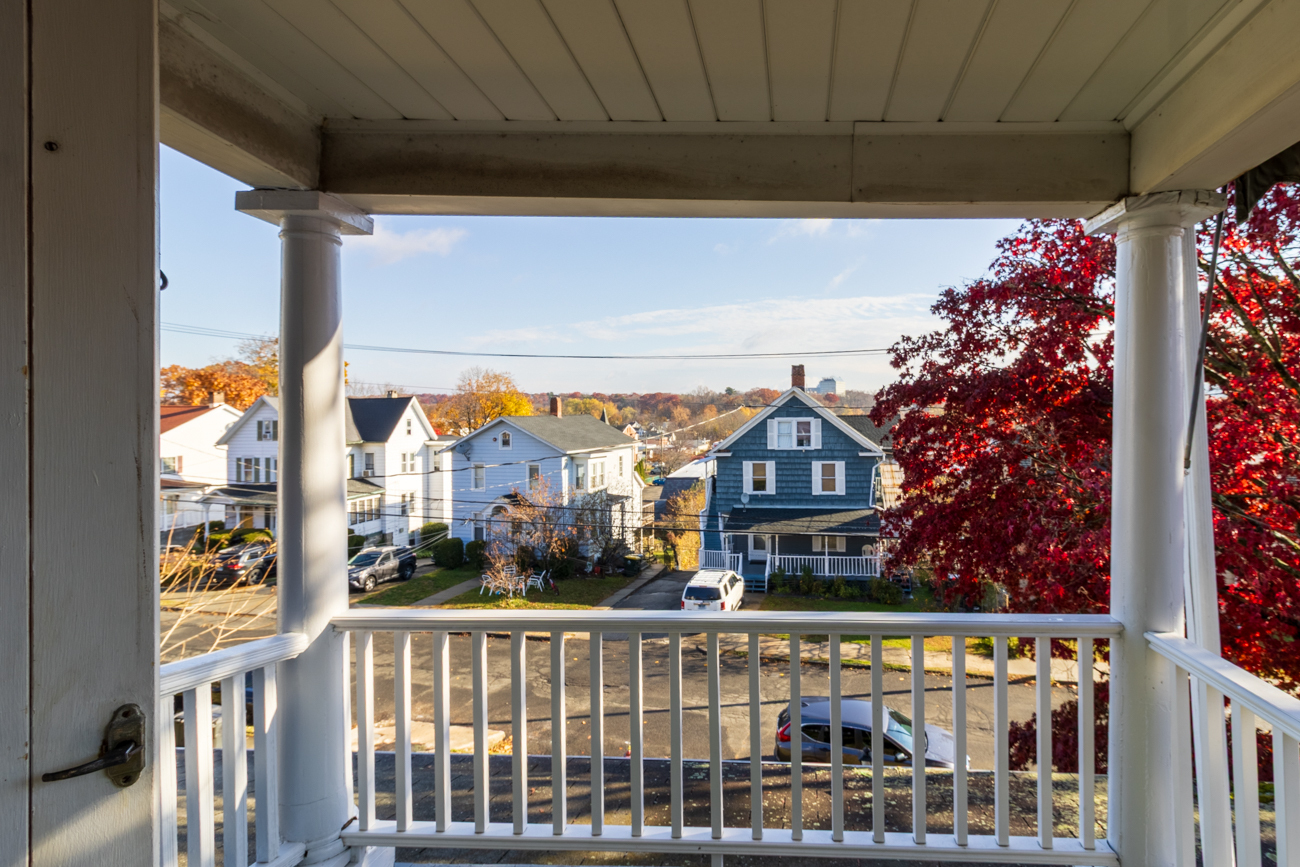 16 Smith Street, Unit 2 Danbury, CT 06810 - Photo 2 of 14 a view of a city from a balcony