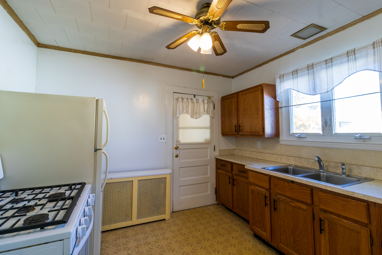 16 Smith Street, Unit 2 Danbury, CT 06810 - Photo 3 of 14 a kitchen with a sink cabinets and window