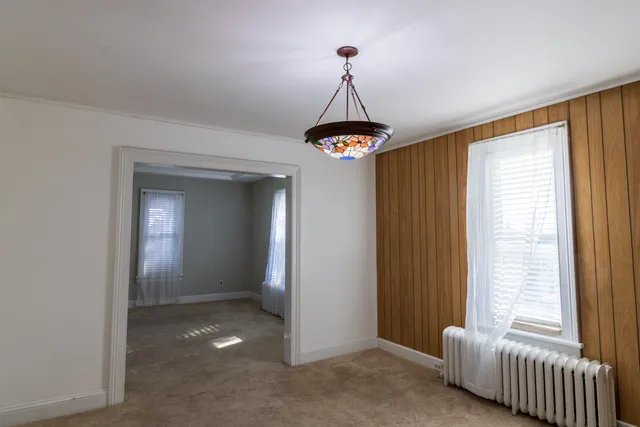 a view of a room with windows