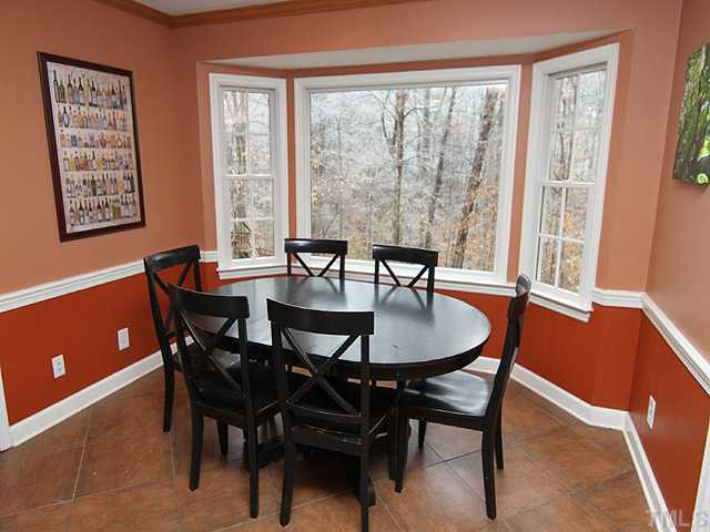 8644 Valley Brook Drive Raleigh, NC 27613 - Photo 4 of 18 BREAKFAST AREA: Light and airy with a great view of the backyard!