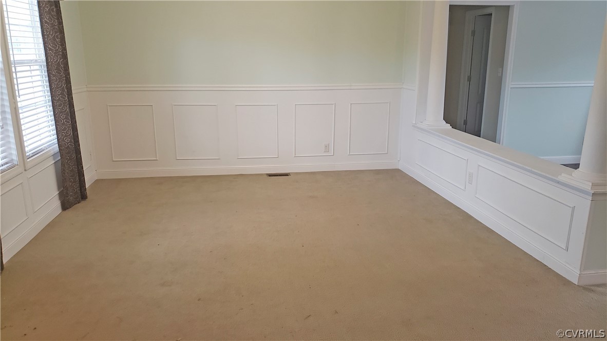 7215 Lunenburg County Road Keysville, VA 23947 - Photo 4 of 16 a view of a room that has a window in it