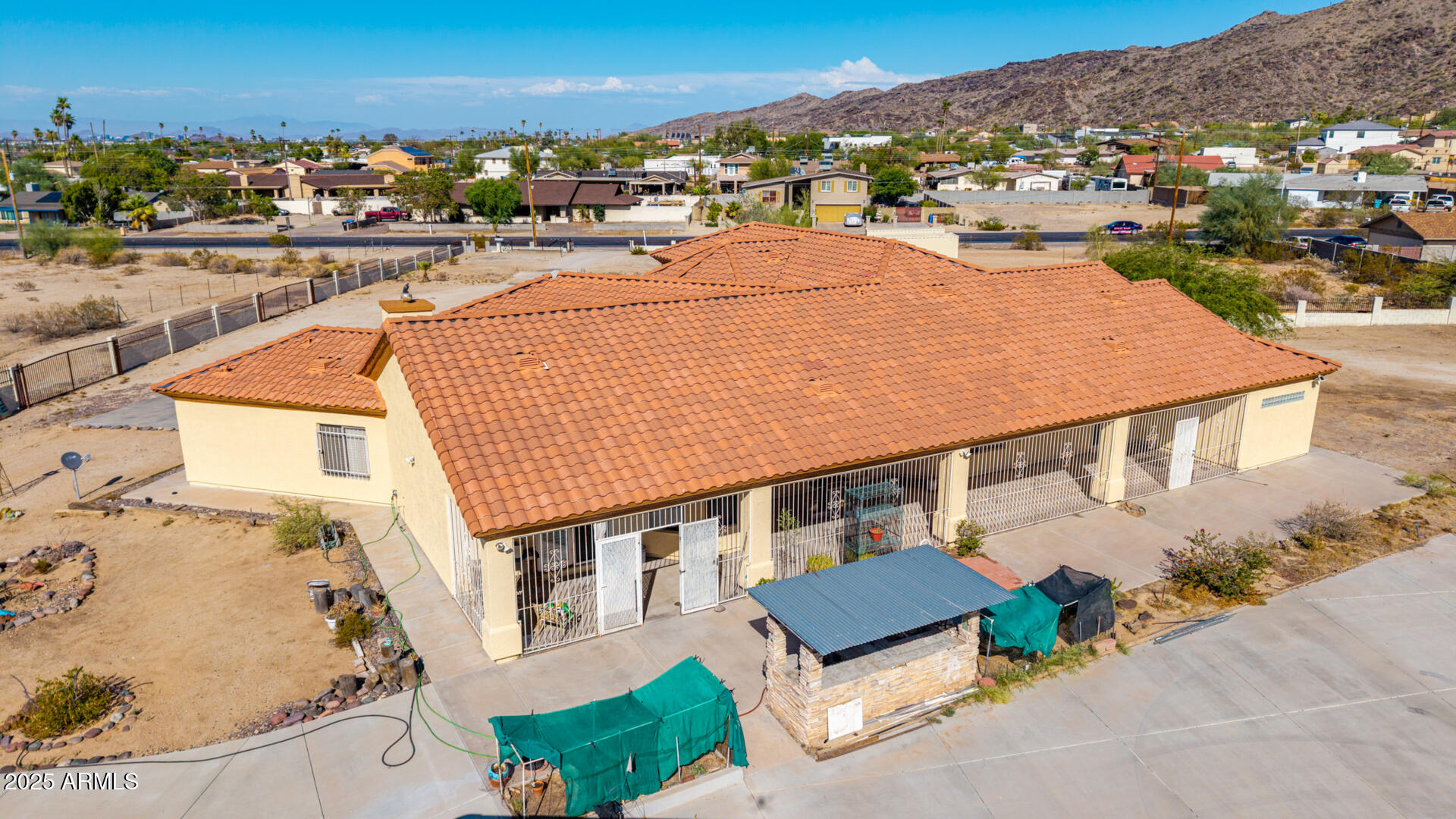 8828 South 16th Street Phoenix, AZ 85042 - Photo 49 of 63 an aerial view of residential houses with outdoor space
