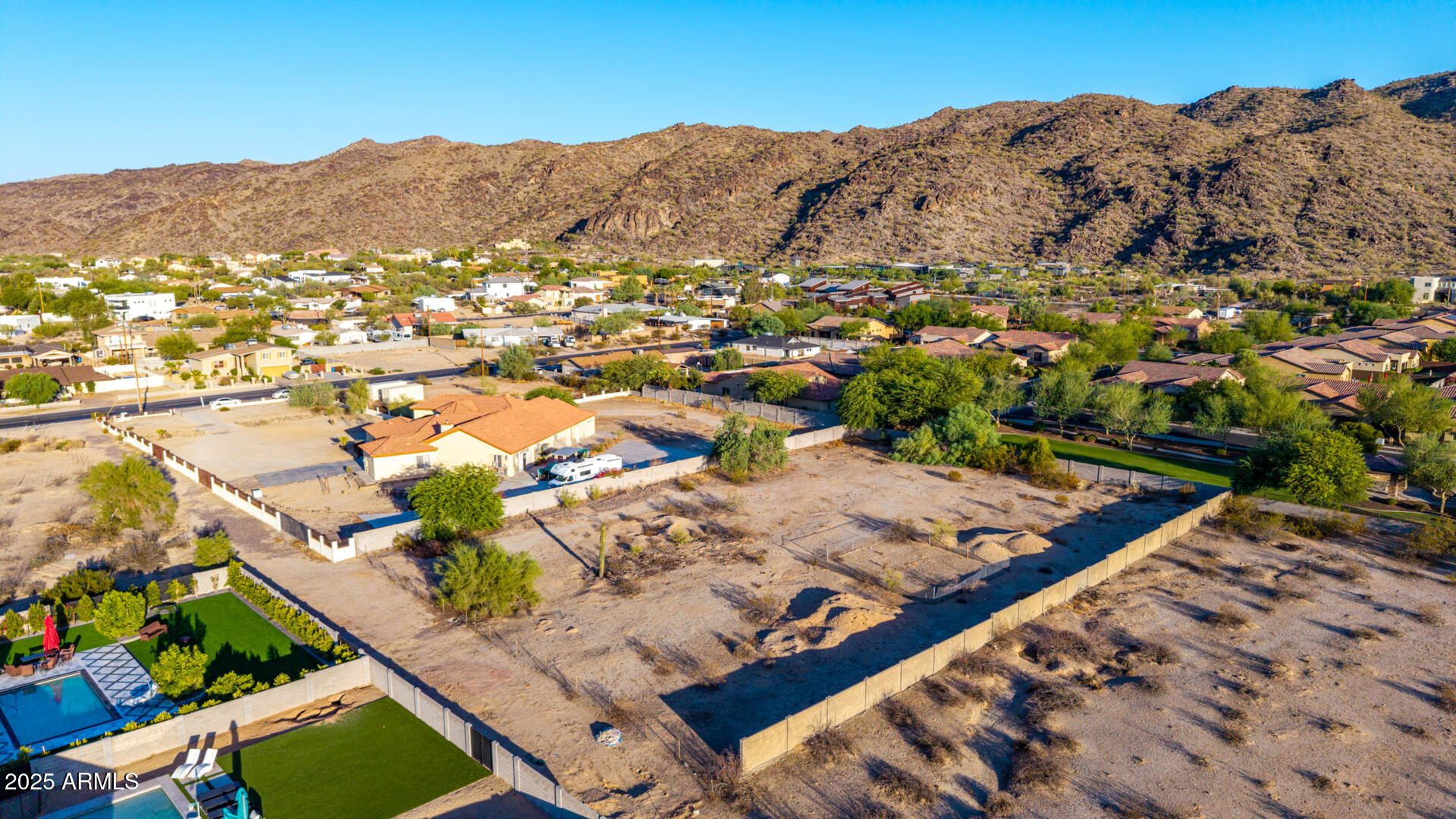 8828 South 16th Street Phoenix, AZ 85042 - Photo 52 of 63 an aerial view of residential houses with outdoor space