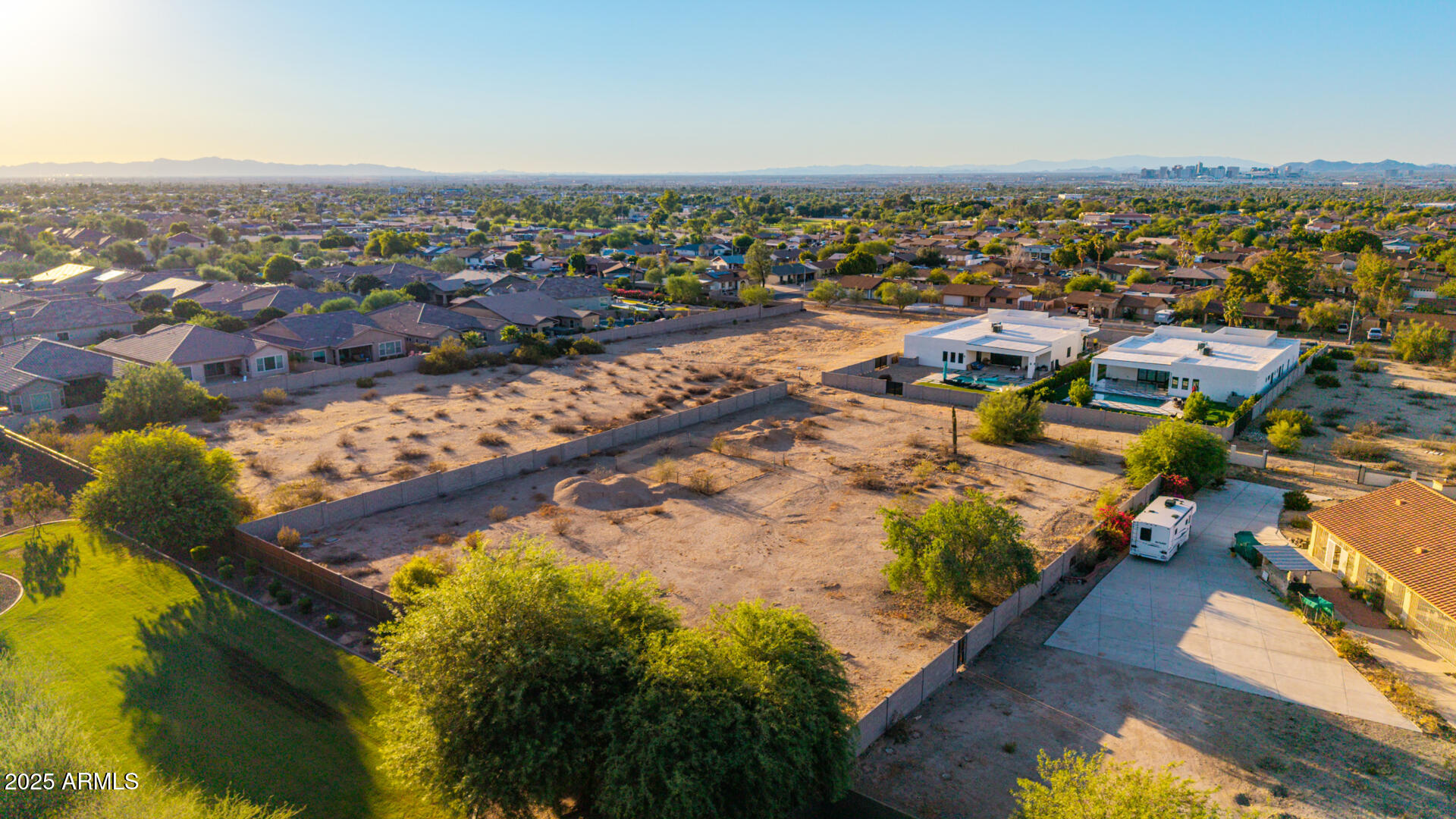 8828 South 16th Street Phoenix, AZ 85042 - Photo 53 of 63 an aerial view of residential houses with outdoor space