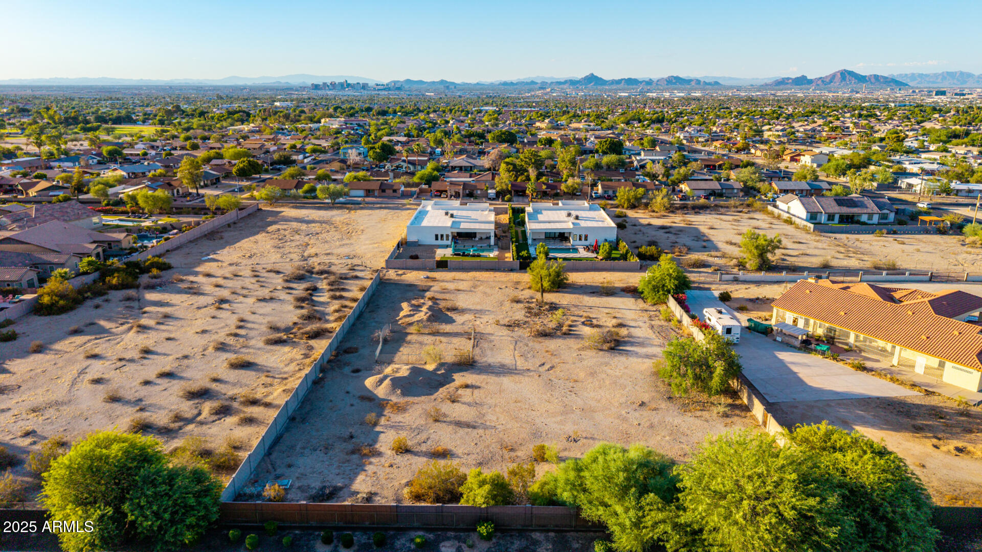 8828 South 16th Street Phoenix, AZ 85042 - Photo 54 of 63 an aerial view of residential houses with outdoor space