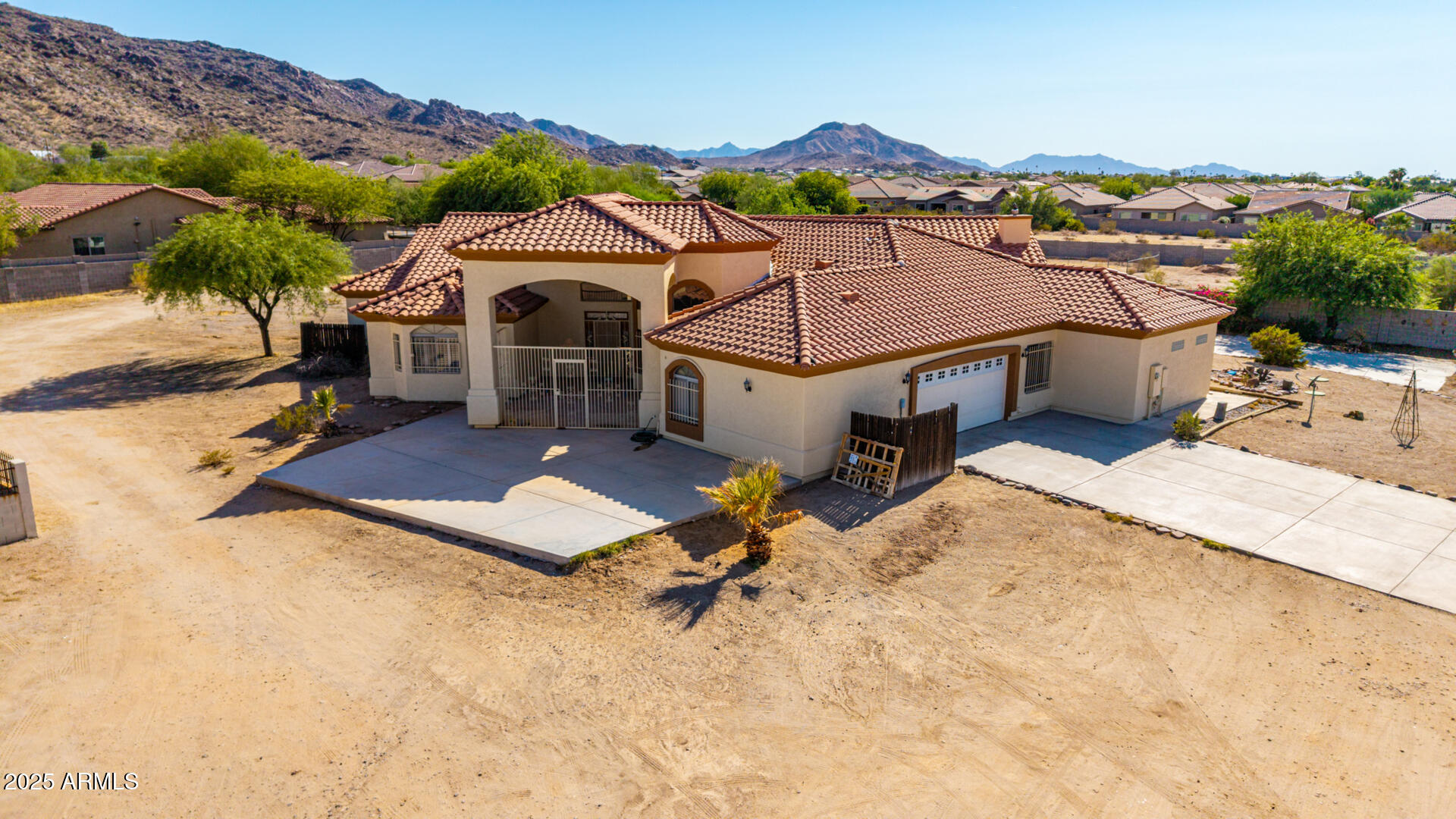 8828 South 16th Street Phoenix, AZ 85042 - Photo 7 of 63 an aerial view of a house with a yard