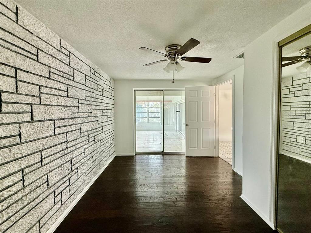 7131 Potomac Drive Port Richey, FL 34668 - Photo 18 of 30 a view of entryway with wooden floor