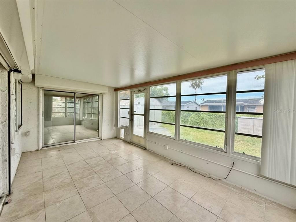 7131 Potomac Drive Port Richey, FL 34668 - Photo 27 of 30 a view of an empty room with a window
