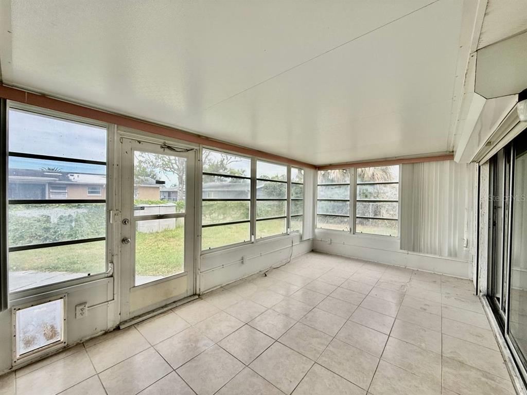 7131 Potomac Drive Port Richey, FL 34668 - Photo 28 of 30 a view of an empty room with a window