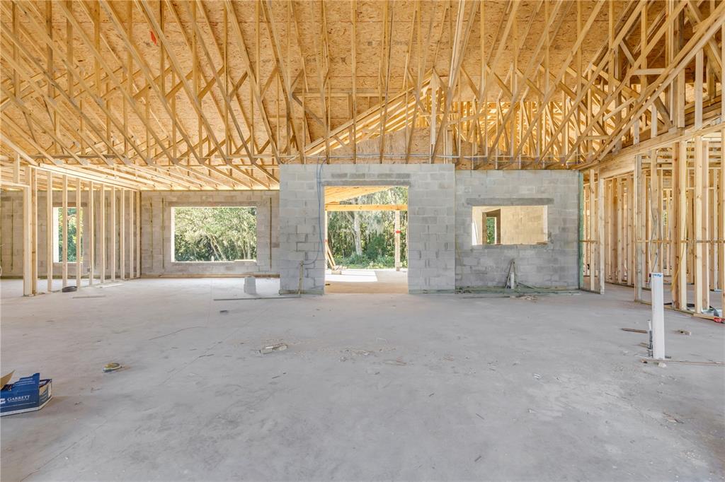 1624 Greens Dairy Road DeLand, FL 32720 - Photo 17 of 51 a view of a house with a yard and garage
