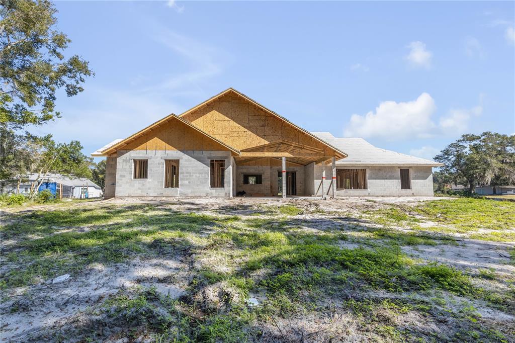 1624 Greens Dairy Road DeLand, FL 32720 - Photo 28 of 51 a view of a house with a yard