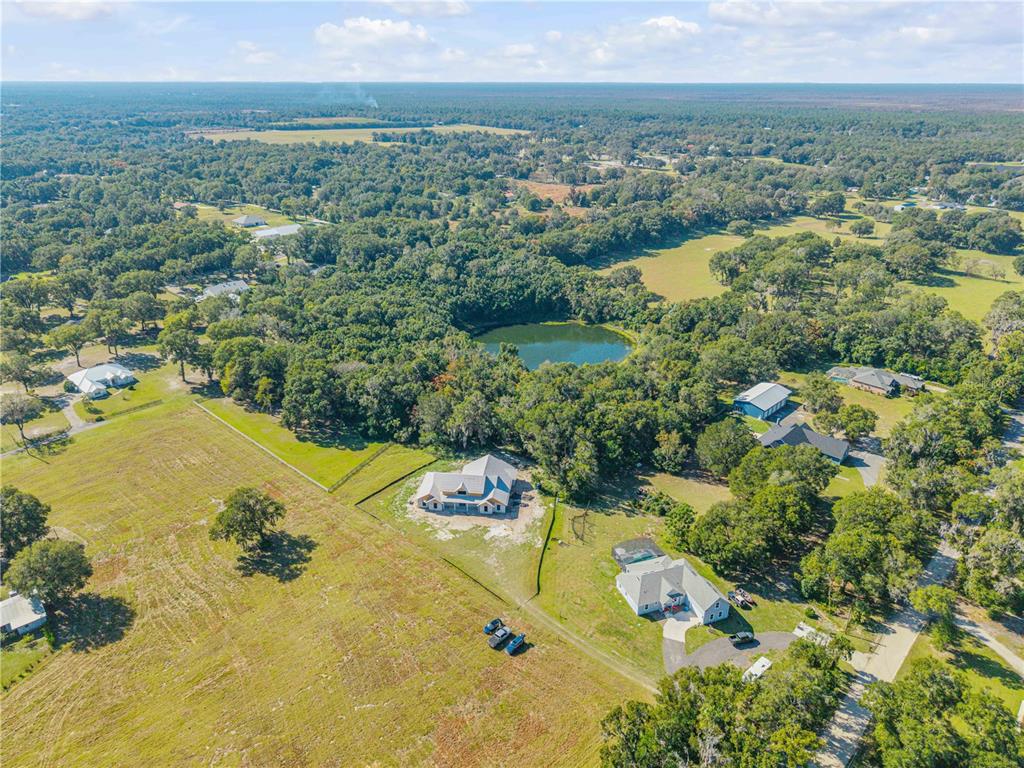 1624 Greens Dairy Road DeLand, FL 32720 - Photo 31 of 51 an aerial view of residential houses with outdoor space