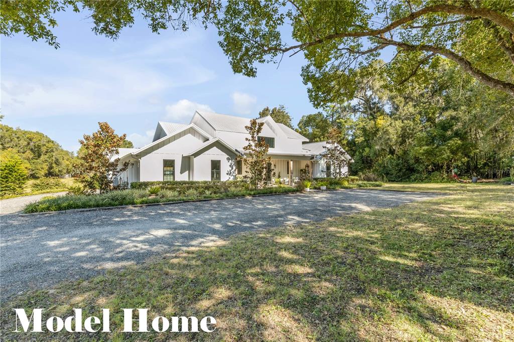 1624 Greens Dairy Road DeLand, FL 32720 - Photo 35 of 51 a view of a house with a yard