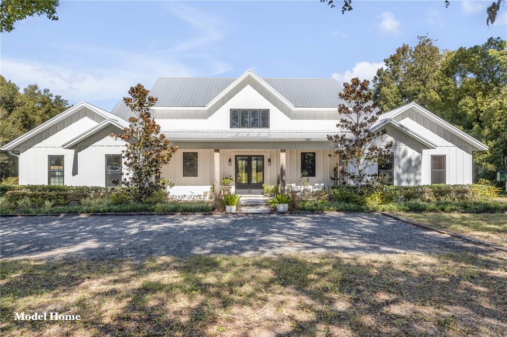 1624 Greens Dairy Road DeLand, FL 32720 - Photo 37 of 51 a view of a house with a yard