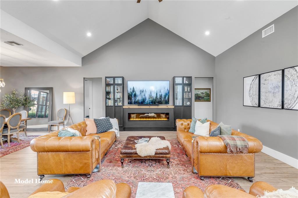 1624 Greens Dairy Road DeLand, FL 32720 - Photo 38 of 51 a living room with furniture and a large window