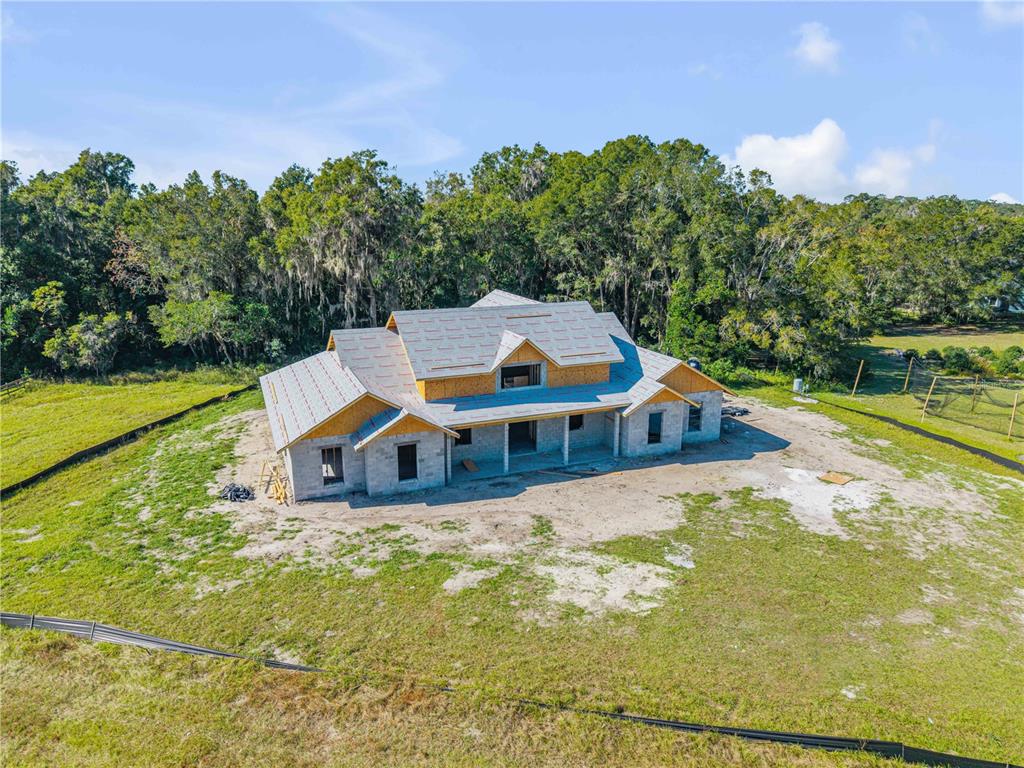1624 Greens Dairy Road DeLand, FL 32720 - Photo 4 of 51 a house with trees in the background