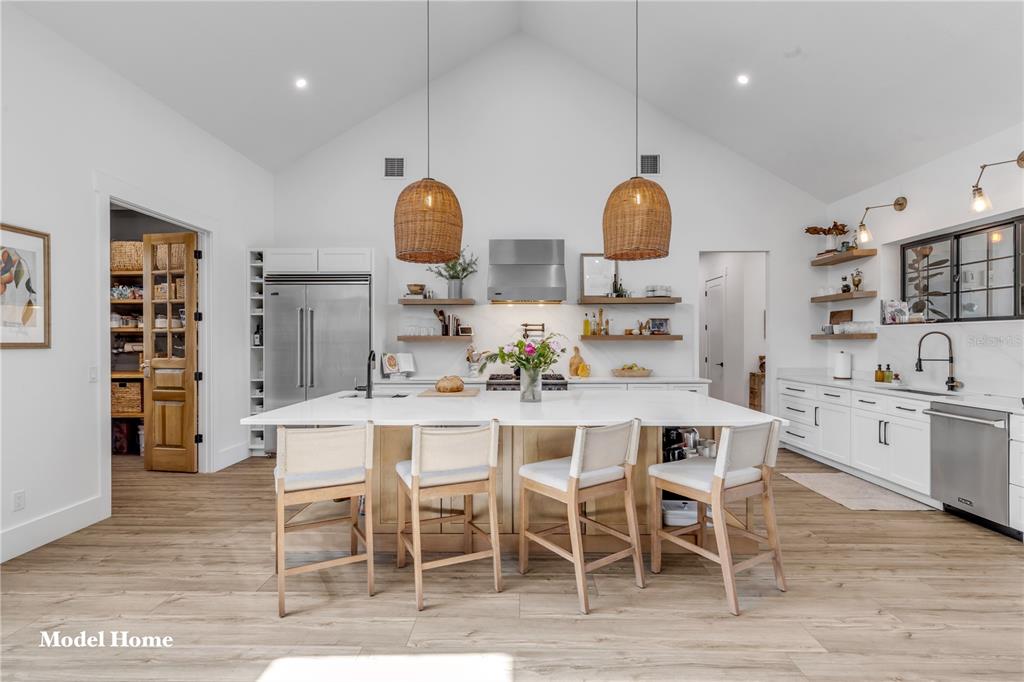 1624 Greens Dairy Road DeLand, FL 32720 - Photo 42 of 51 a dining room with wooden floor a sink and a window