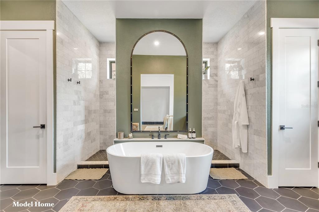 1624 Greens Dairy Road DeLand, FL 32720 - Photo 48 of 51 a view of a bathroom with a tub and a mirror