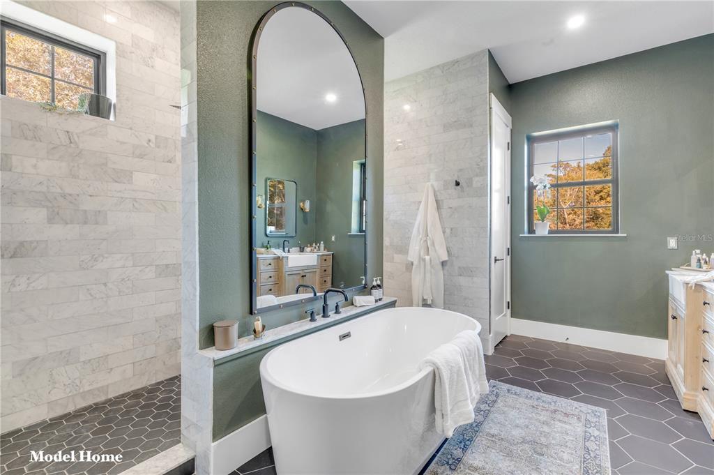 1624 Greens Dairy Road DeLand, FL 32720 - Photo 51 of 51 a spacious bathroom with a bathtub and shower