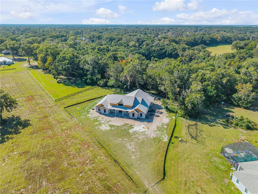 1624 Greens Dairy Road DeLand, FL 32720 - Photo 7 of 51 a view of a swimming pool and mountains