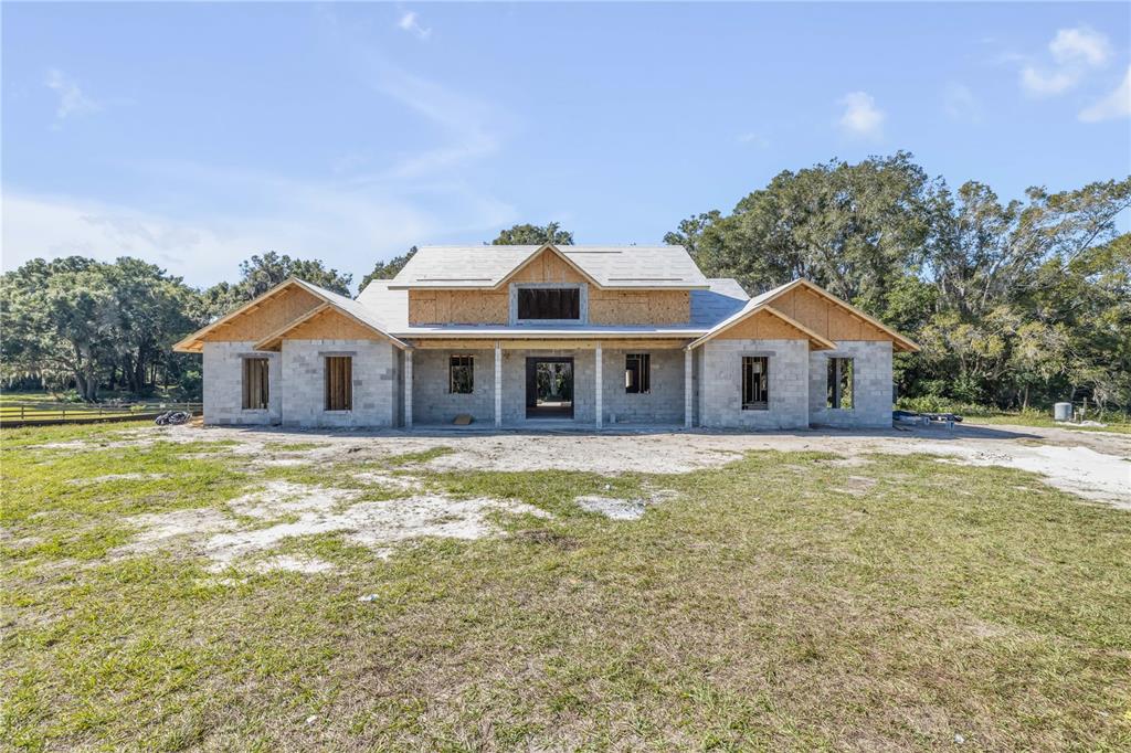 1624 Greens Dairy Road DeLand, FL 32720 - Photo 9 of 51 a front view of a house with a yard