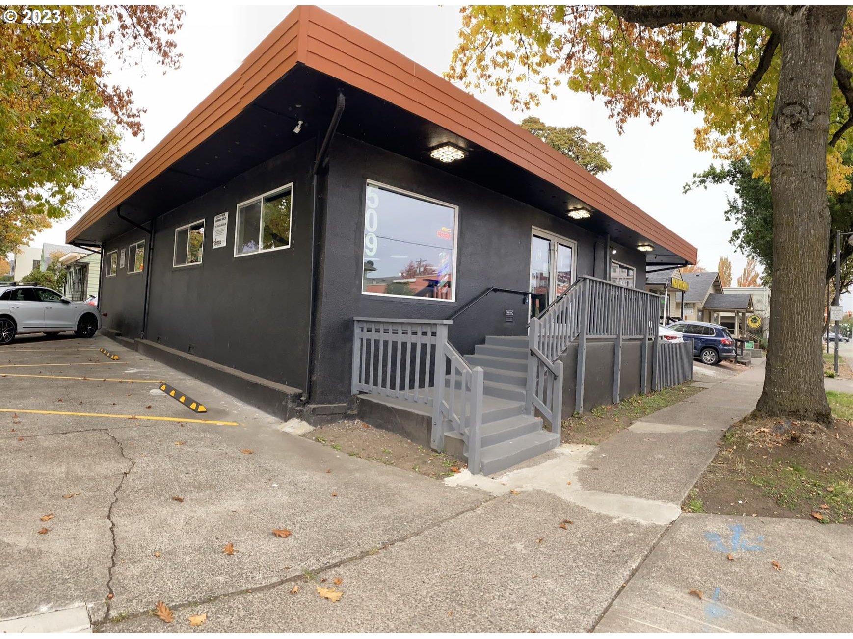 509 East 13th Avenue Eugene, OR 97401 - Photo 1 of 21 a backyard of a house with table and chairs