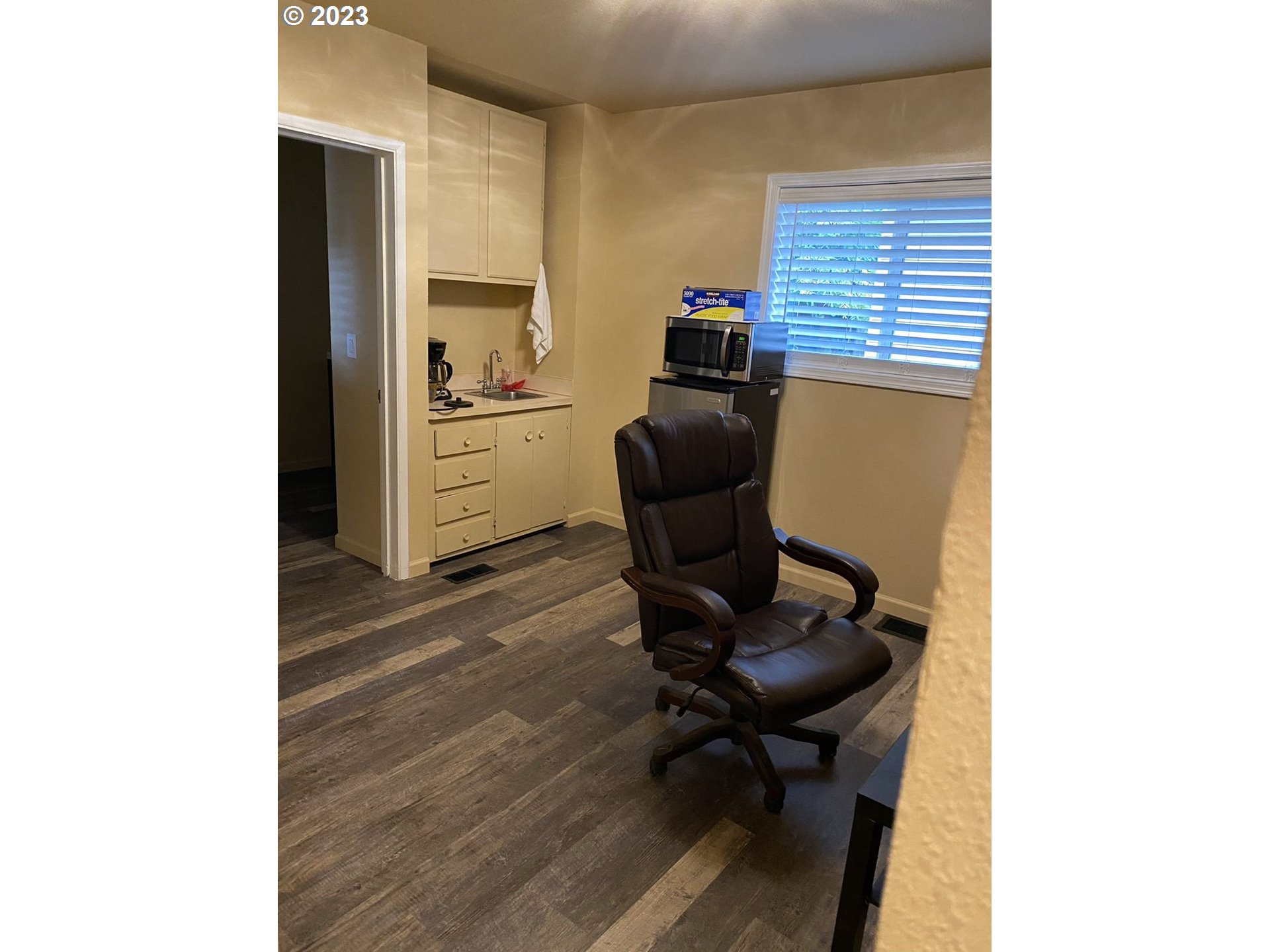 509 East 13th Avenue Eugene, OR 97401 - Photo 12 of 21 a view of a workspace with furniture and a window