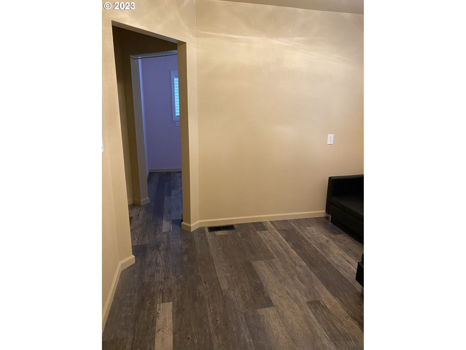 509 East 13th Avenue Eugene, OR 97401 - Photo 13 of 21 a view of a hallway with wooden floor