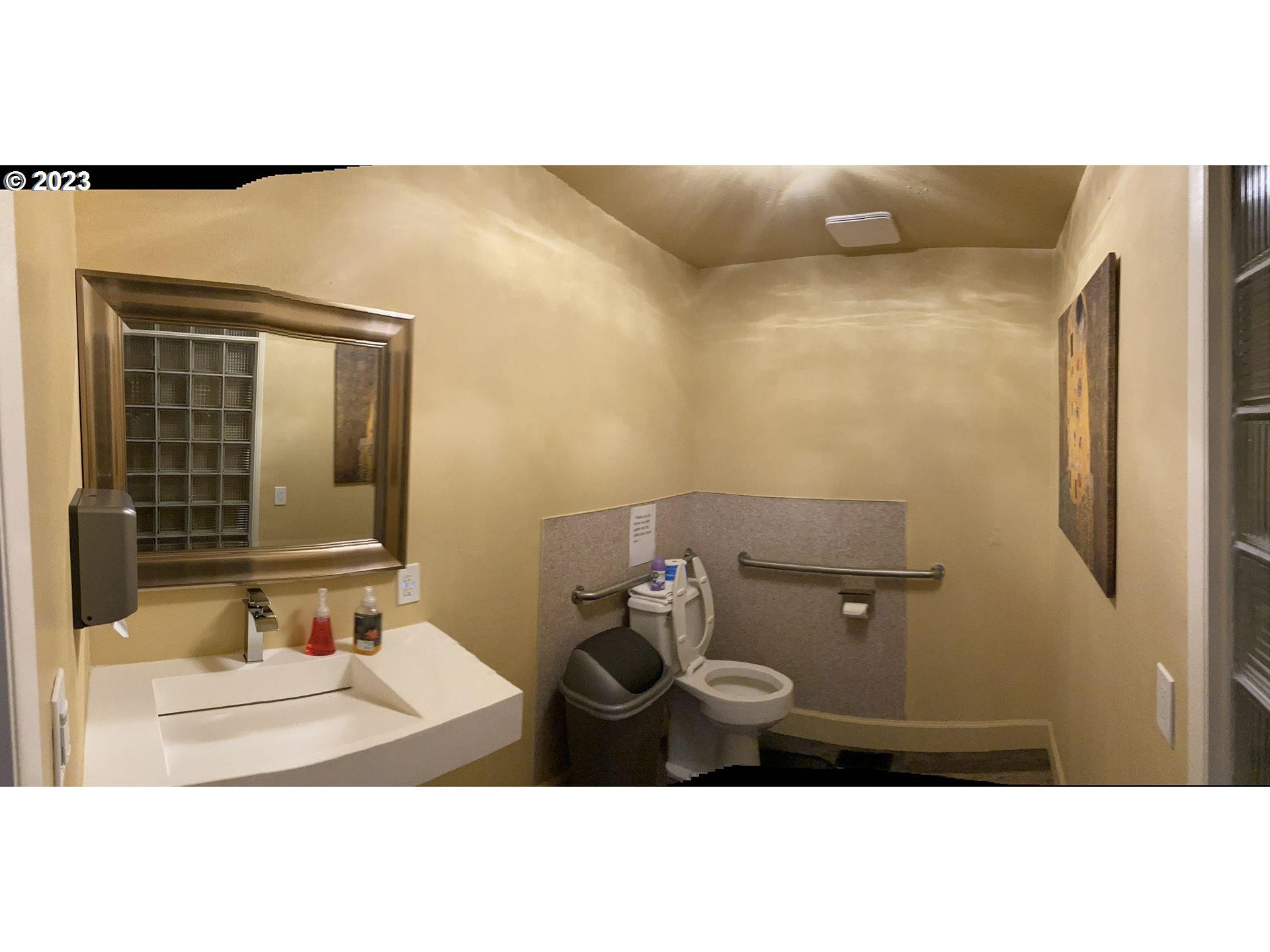 509 East 13th Avenue Eugene, OR 97401 - Photo 14 of 21 a bathroom with a sink and a mirror