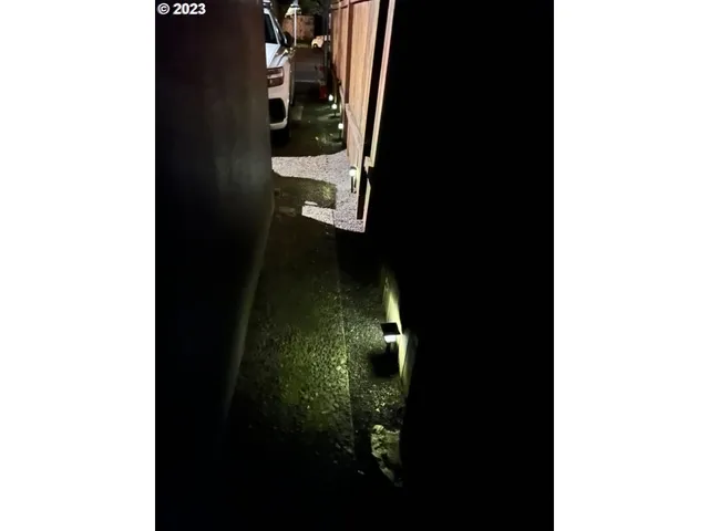 a bedroom with furniture and a bed