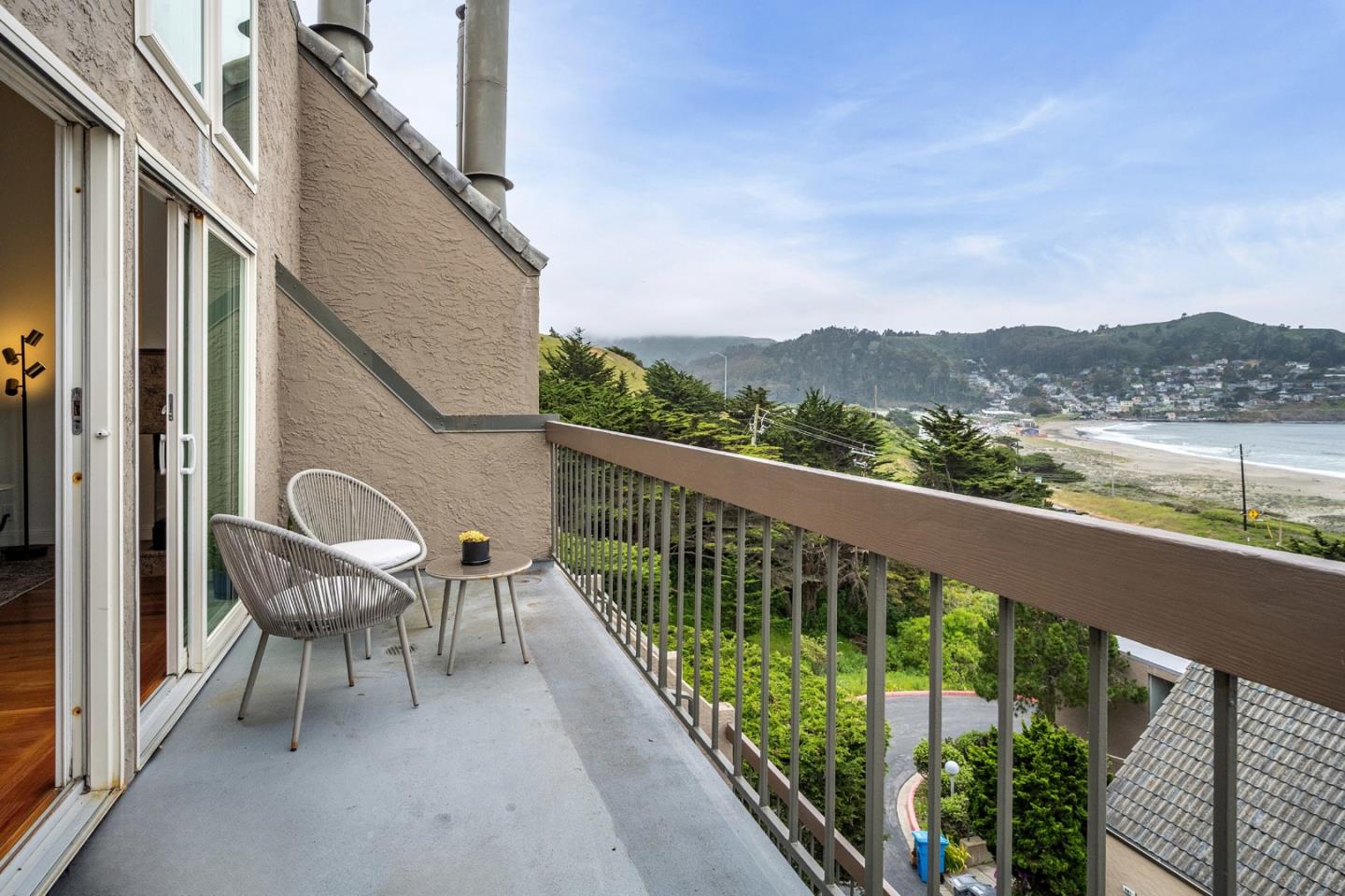 445 Roberts Road Pacifica, CA 94044 - Photo 11 of 40 a view of a chair and table on the balcony