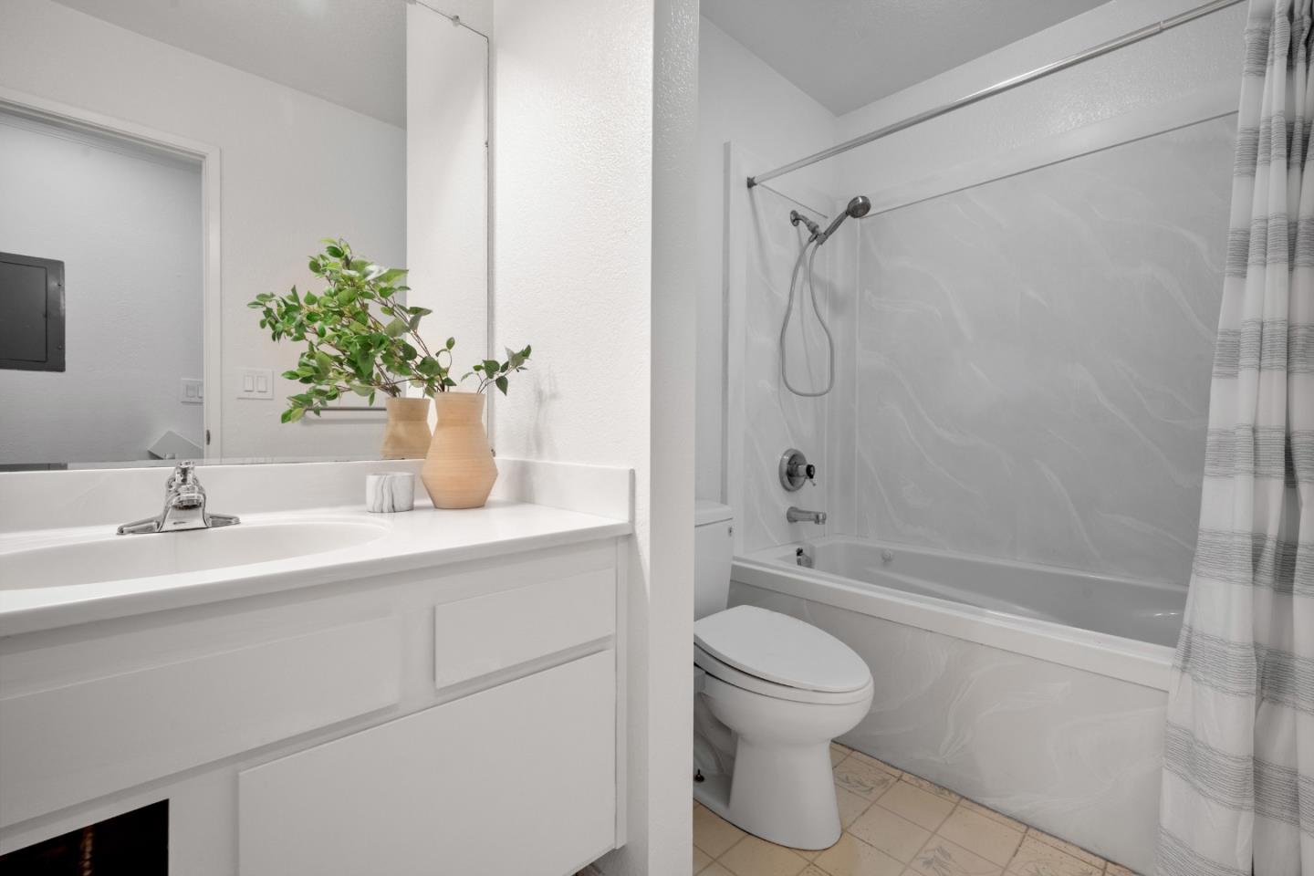 445 Roberts Road Pacifica, CA 94044 - Photo 19 of 40 a bathroom with a sink toilet and shower