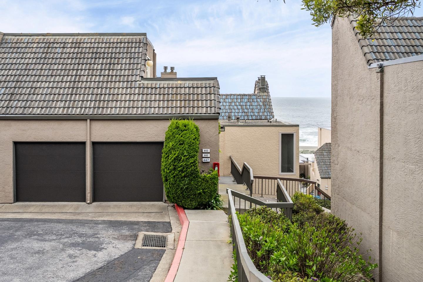 445 Roberts Road Pacifica, CA 94044 - Photo 33 of 40 a front view of a house with plants