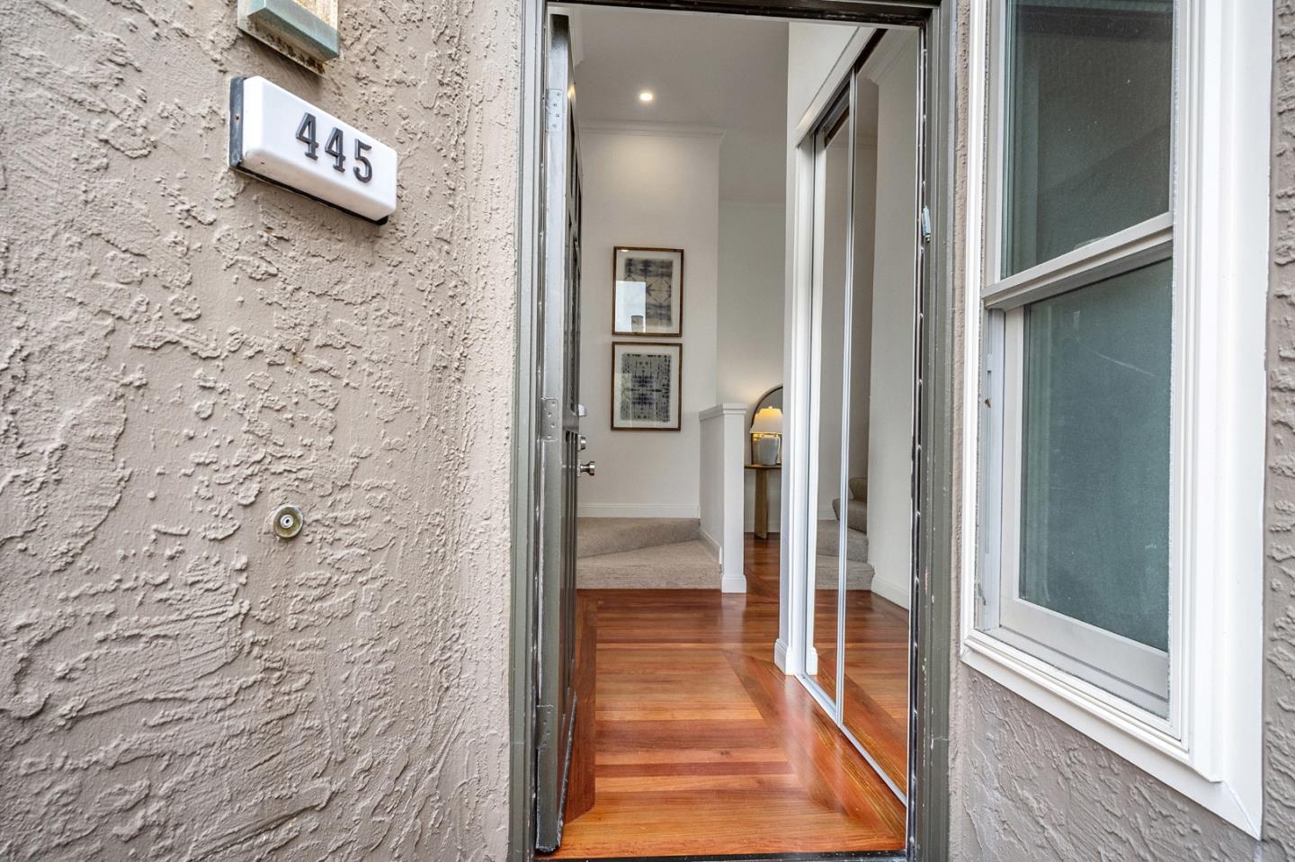 445 Roberts Road Pacifica, CA 94044 - Photo 5 of 40 a hallway with a door