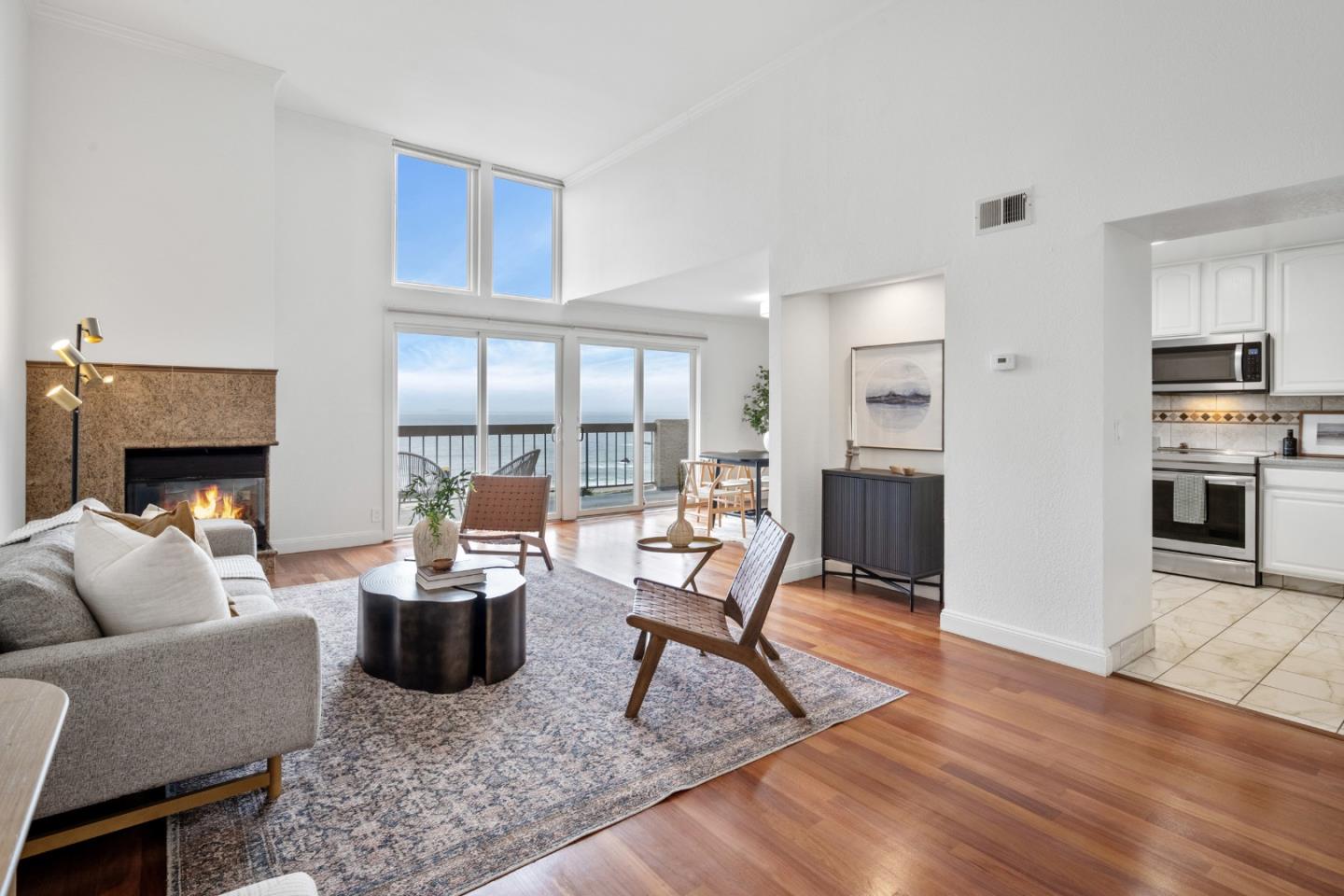 445 Roberts Road Pacifica, CA 94044 - Photo 6 of 40 a living room with furniture and a fireplace
